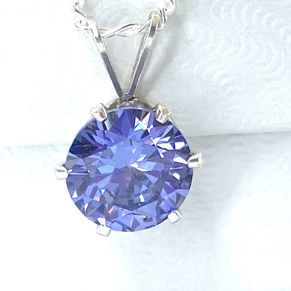 Beautiful huge Tanzanite necklace.   December birthstone. 8mm round pendant on a figaro chain. Gift packaged and ready for giving.