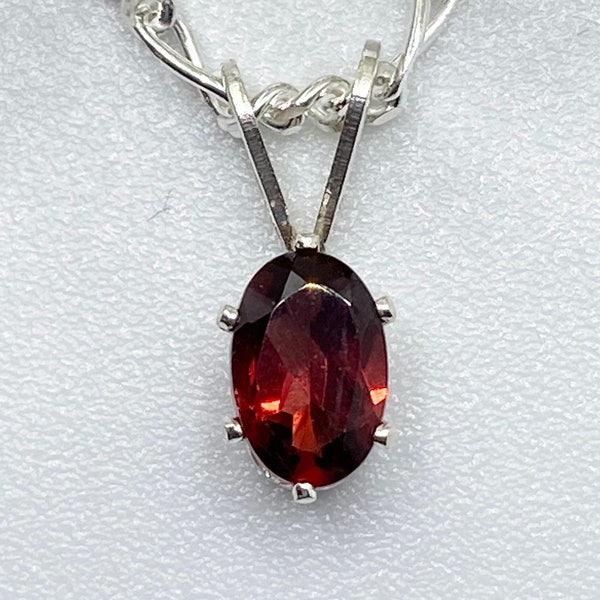 Genuine Mozambique Garnet necklace.  January birthstone 7x5mm oval garnet set in sterling silver pendant. Gift packaged and ready for giving
