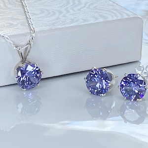 Tanzanite Jewelry Set December Birthstone Gift Sterling Silver Pendant Necklace Matching Earrings Cubic Zirconia Purple Gemstone Birthday Present Elegant Design Eight MM Stones Eighteen Inch Figaro Chain Three Carat Total Weight Beautiful