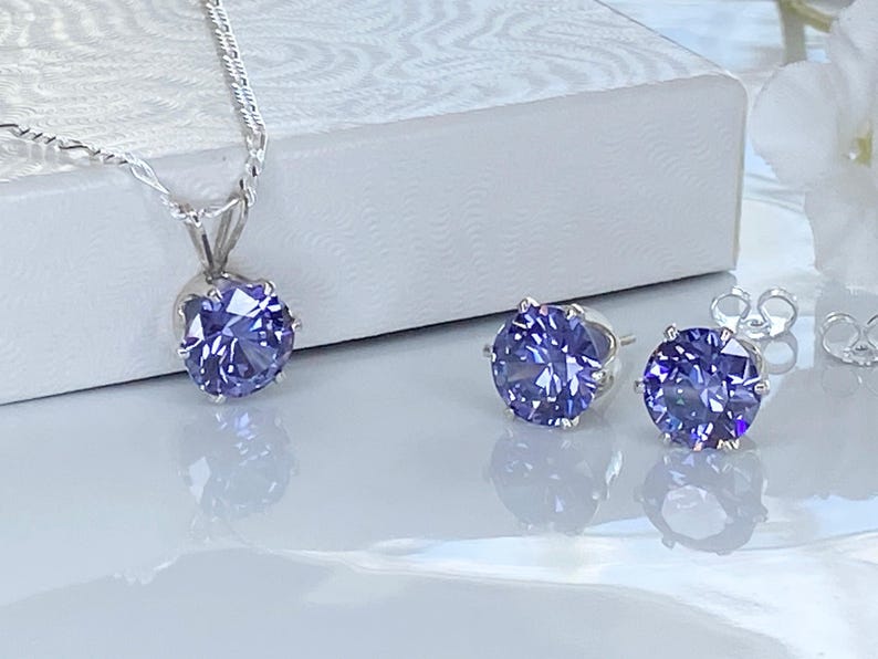 Tanzanite Jewelry Set December Birthstone Gift Sterling Silver Pendant Necklace Matching Earrings Cubic Zirconia Purple Gemstone Birthday Present Elegant Design Eight MM Stones Eighteen Inch Figaro Chain Three Carat Total Weight Beautiful