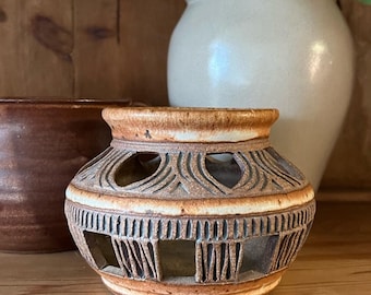 Vintage hand spun ceramic candle holder