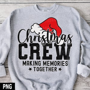 May include: Gray sweatshirt with a red and white Santa hat graphic and the text "Christmas Crew Making Memories Together".
