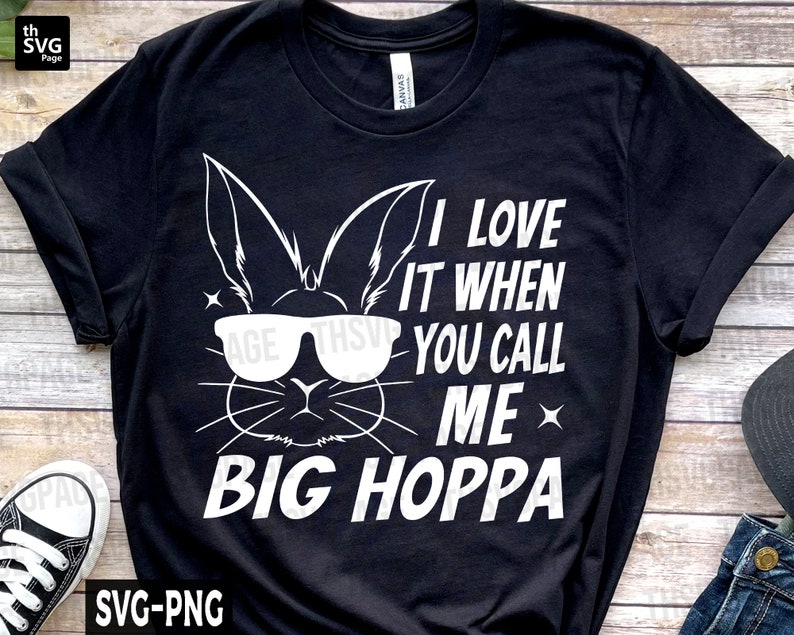 May include: Black t-shirt with a white graphic of a bunny wearing sunglasses and the text "I love it when you call me Big Hoppa".