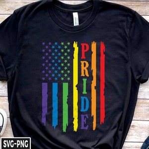 May include: Black t-shirt with a rainbow pride flag design and the word "PRIDE" in white letters.