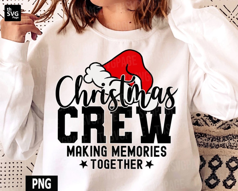 May include: White sweatshirt with a black and red graphic that says "Christmas Crew Making Memories Together" with a Santa hat graphic.