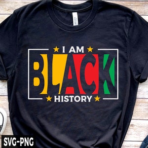 May include: Black t-shirt with a white rectangle containing the text "I AM BLACK HISTORY" in yellow, red, and green letters with stars on either side.