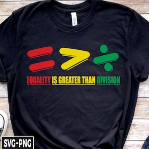 May include: Black t-shirt with a graphic design of an equals sign, a greater than sign, and a division sign. The text "Equality is greater than division" is printed below the graphic.
