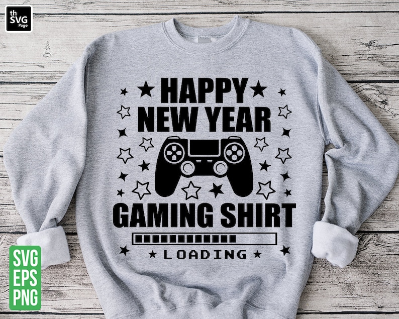 K&ouml;nnte beinhalten: Ein graues Sweatshirt mit einem schwarzen Grafikdesign eines Videospielcontrollers und dem Text "Happy New Year Gaming Shirt" mit einem Ladebalken darunter. Der Text ist von schwarzen Sternen umgeben.