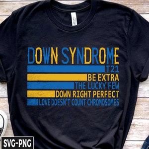 Pode incluir: Camiseta preta com um design listrado azul e amarelo e o texto "Down Syndrome T21 Be Extra The Lucky Few Down Right Perfect Love Doesn't Count Chromosomes".