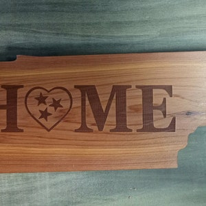"HOME" em formato de Tennessee com arquivo digital Tristar em formato de coração