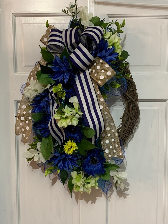 Blue & White Funeral Flower Wreath by Everyday Flowers