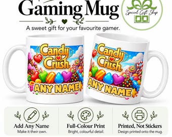 May include: Two white ceramic mugs featuring a colourful Candy Crush game graphic with various candy shapes and the text ANY NAME. The mugs are displayed alongside text elements including Personalised Gaming Mug, Add Any Name, and Printed, Not Stickers.
