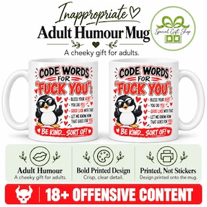 May include: Two white ceramic mugs featuring a graphic of a penguin wearing sunglasses and giving the middle finger. The text reads: CODE WORDS FOR FUCK YOU: BLESS YOUR HEART, YOU DO YOU, GOOD LUCK WITH THAT, LET ME KNOW HOW THAT GOES FOR YOU.