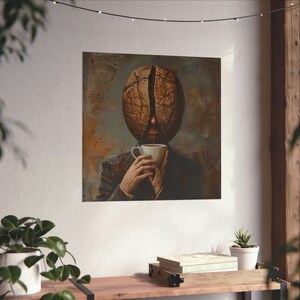 May include: Surreal painting of a person with a coffee bean for a head, drinking from a white coffee cup.