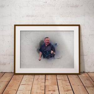 May include: A framed watercolor illustration of a man in a dark blue shirt with a white and black pattern. The man is raising his fist in the air and has a determined expression on his face. The background is a light blue watercolor wash. The man's name, "Darrant", is written in white cursive below him.