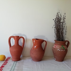 Vintage Ceramic Clay Amphora Jug: Rural Folk Pottery Terracotta Art with Antique Rustic Charm for Unique Home Decor