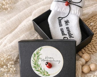 Black gift packaging with ladybug