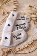 White cotton baby socks: Personalized pregnancy announcement gift for grandparents product logo