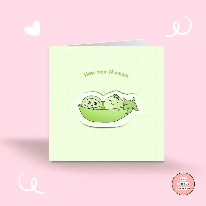 May include: A green card with a light green background and a white grid pattern. The card has the text "Hap-pea Nikkah" in black text. There is a sticker of two peas in a pea pod with faces and arms. The sticker is on a white background. The text "The Mosque Sketcher" is in a pink circle in the bottom right corner.