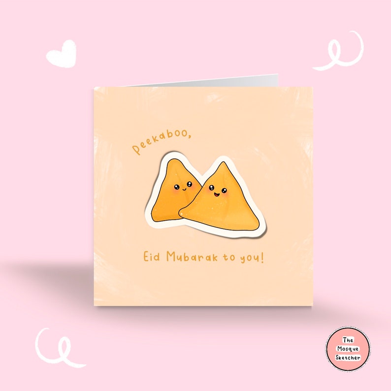 May include: A light peach card with the text "Peekaboo, Eid Mubarak to you!" and a cartoon illustration of two smiling samosas.