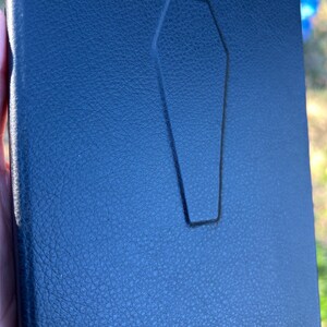 This handmade coffin-style journal embodies bold gothic minimalism; subtle, striking, and unapologetically dark.