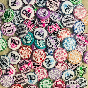 10pc CNA&#39;s Rock flatbacks, 1&quot; flatbacks. Pinbacks, flatbacks