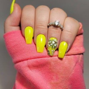 Floral nails| Neon yellow coffin nails| Luxury press on nails| Fake nails| Glue on nails| Gel nails| Neon nails| Spring nails| Summer nails