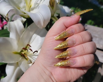 Gold glitter press on nails| Stiletto nails| Luxury press on nails| Fake nails| Glue on nails| Gel nails| Gold press on nails| Acrylic nails
