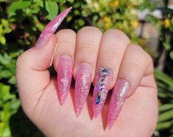 Pink glitter press on nails| Stiletto nails| Luxury press on nails| Fake nails| Glue on nails| Gel nails| Pink press on nails| Acrylic nails