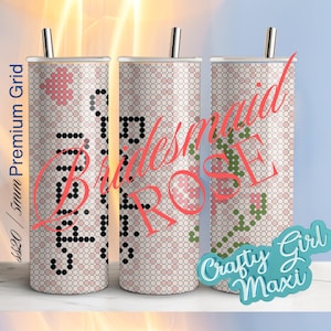 May include: Three stainless steel tumblers with a white background and a pink and green floral pattern. The tumblers have a black and white grid pattern and the text "Bride" and "Maid" in pink.