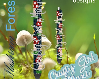 May include: Two blue and white pens with a floral pattern and the text "Crafty Girl Maxi" on them. The pens are in front of a green background with mushrooms.
