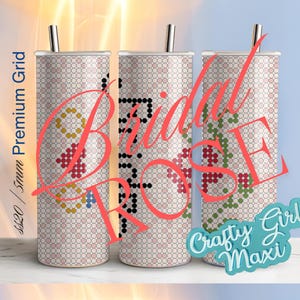 May include: Three 20 oz stainless steel tumblers with a cross-stitch design of a rose. The tumblers are white with a grid pattern. The text "Bridal Rose" is written in pink and red letters. The text "Crafty Girl Maxi" is written in blue letters.