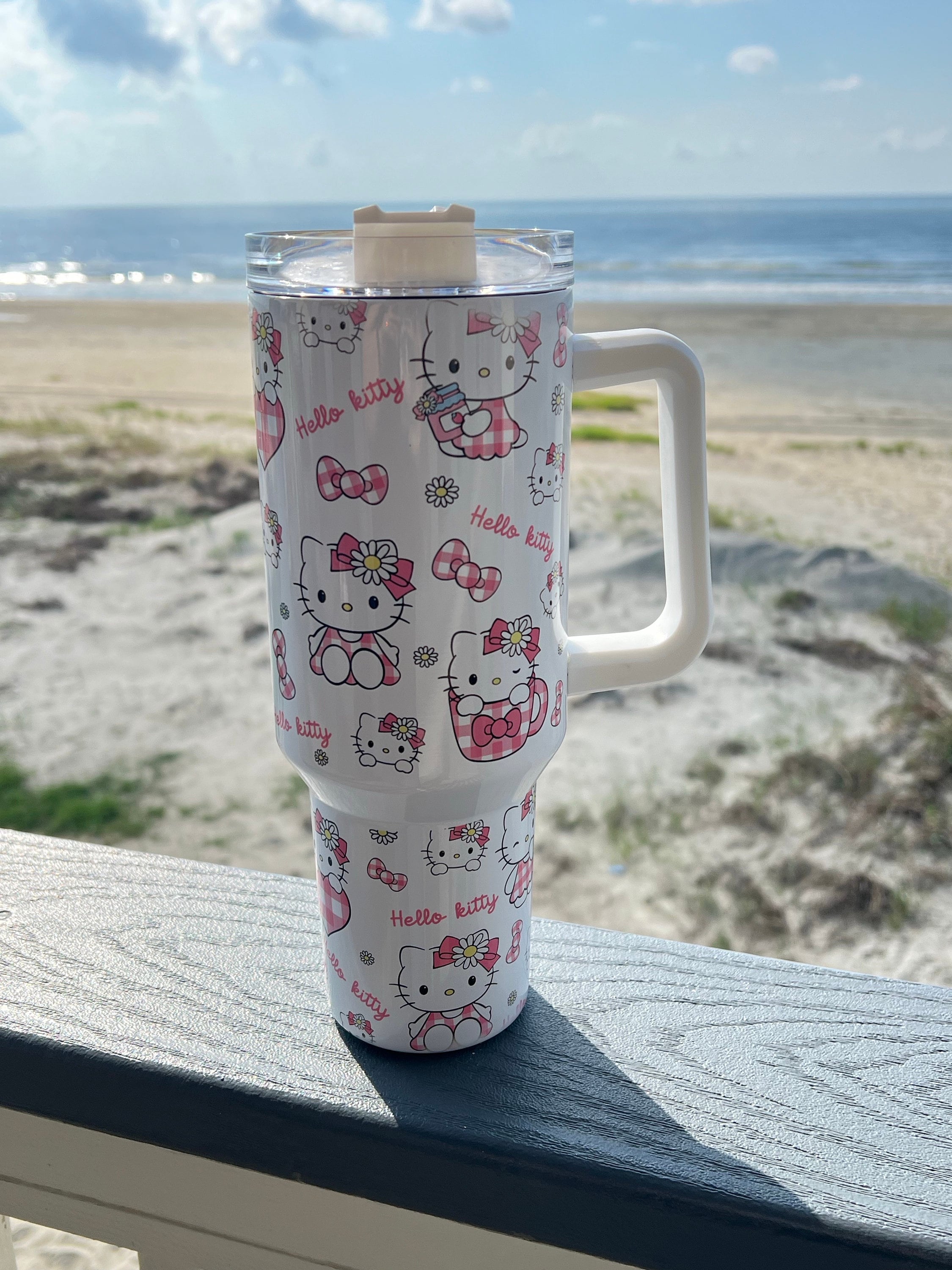 Amazon.com: Bioworld Hello Kitty CD Collection 40 Oz Pink  40 oz holographic Hello Kitty tumbler display picture 1