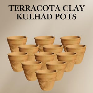 May include: A group of 12 terracotta clay kulhad pots, arranged in a triangular pattern. The pots are a light brown color and have a textured surface.