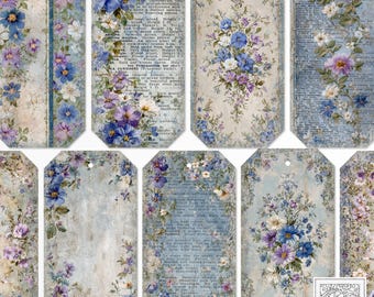May include: A collection of vintage-style gift tags with floral designs. Each tag features a unique arrangement of blue, purple, and white flowers against a textured background. Some tags have text, and all have a hole for stringing.