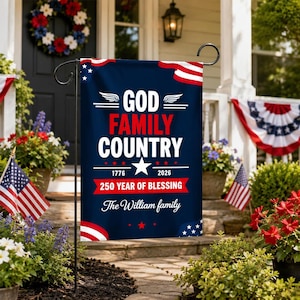 May include: A navy blue garden flag with the words "GOD FAMILY COUNTRY" in white and red. The flag also includes the years 1776 and 2026, and the text "250 YEAR OF BLESSING". The flag is personalized with "The William family".