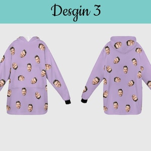 Puede incluir: Una sudadera con capucha de color morado con un patr&oacute;n repetido de un rostro de persona. La sudadera tiene capucha y mangas largas.