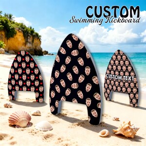 May include: Three swimming kickboards with a pointed top and two cutouts at the base. The boards feature a black background with a repeating pattern of a person's face. One board includes red hearts, and another displays the text CUSTOM TEXT.