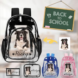 May include: A clear backpack, a lunch bag, and a pencil case, each featuring a printed image of a black and white dog and the name Ricky. A green chalkboard with the text BACK TO SCHOOL is displayed above the items, alongside a reference photo.