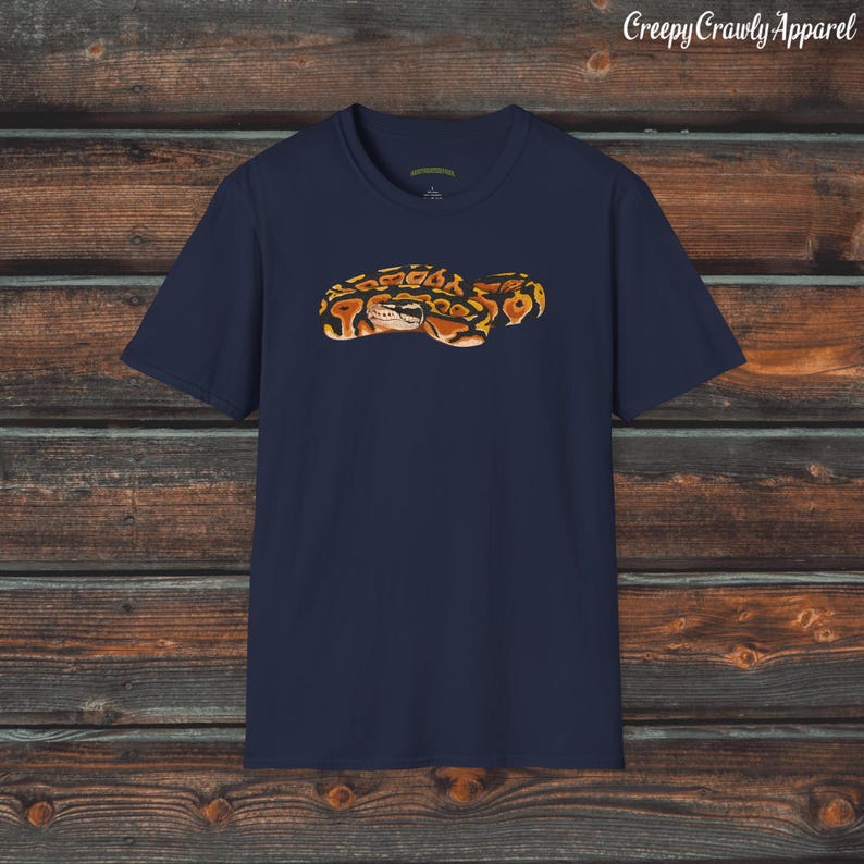 May include: A navy blue t-shirt with a graphic of a brown and orange snake.