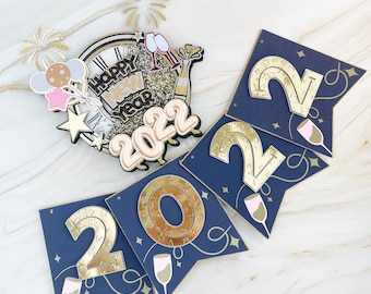 New year banner with matching new years eve cake topper, is a beautiful collection to celebrate a happy New year eve with family & friends!