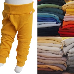 Split pants for babies and toddlers to keep them diaper-free and dry are made from 100% upcycled wool in your desired color