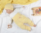 Baby set of trousers and cap for newborns 50/56 made of 100% upcycled cashmere in pastel yellow with mini flaw