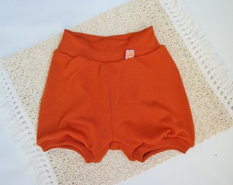 Pantaloncini per bambini 98/104 realizzati al 100% in lana merino riciclata in arancione ruggine