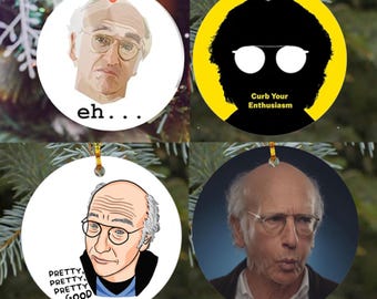 May include: Four round Christmas ornaments featuring images of a man with glasses. One ornament has the text "eh...". Another has the text "Curb Your Enthusiasm". The third has the text "Pretty, Pretty, Pretty, Good".
