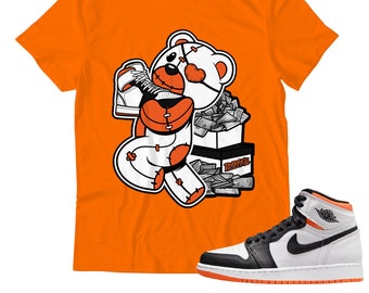 black and orange jordan shirt