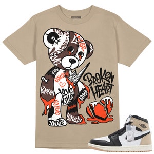 Latte 1s DopeSrill Unisex T-Shirt Gebrochenes Herz Grafik - Mittelbraun Tshirt