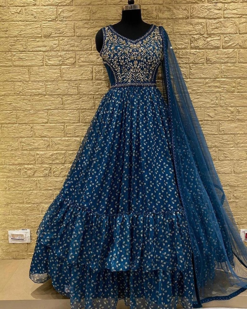 Attractive Georgette Gown With Embroidery Work And Net Dupatta In This Beautiful Long Dress For Women