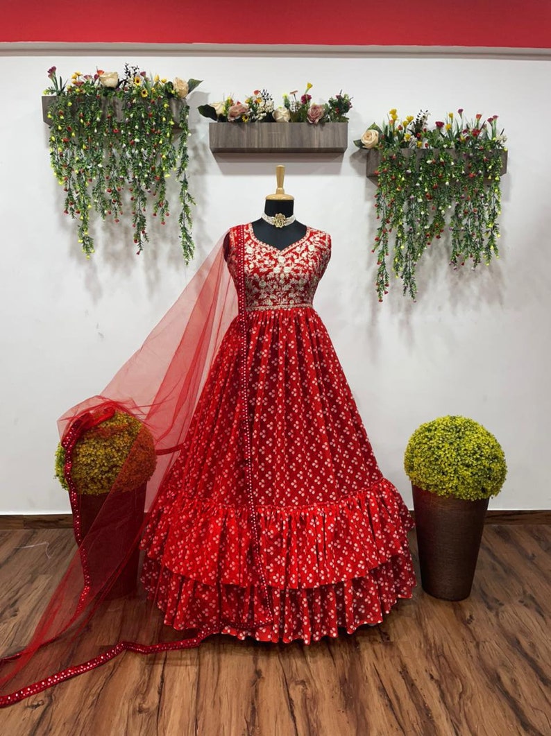 Attractive Georgette Gown With Embroidery Work And Net Dupatta In This Beautiful Long Dress For Women