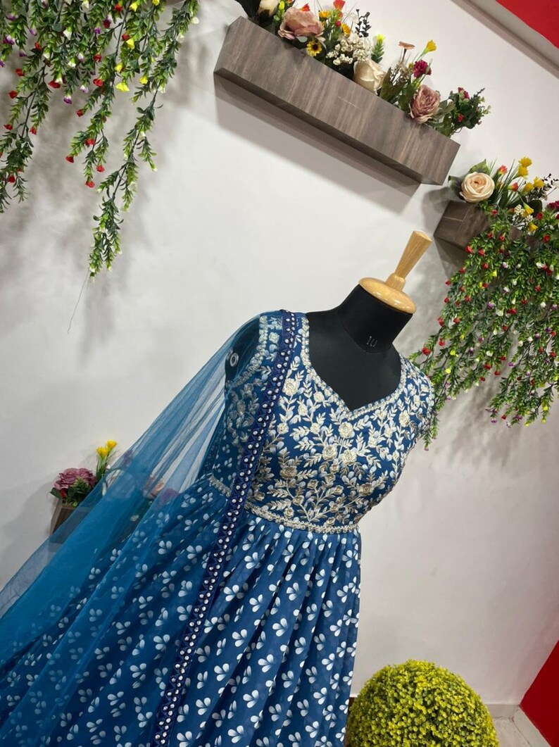 Attractive Georgette Gown With Embroidery Work And Net Dupatta In This Beautiful Long Dress For Women